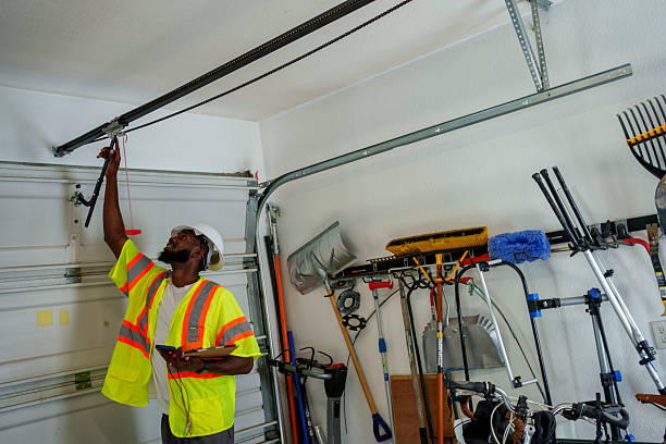 Professional Garage Door Panel Replacement technician working in Howard County County, IA